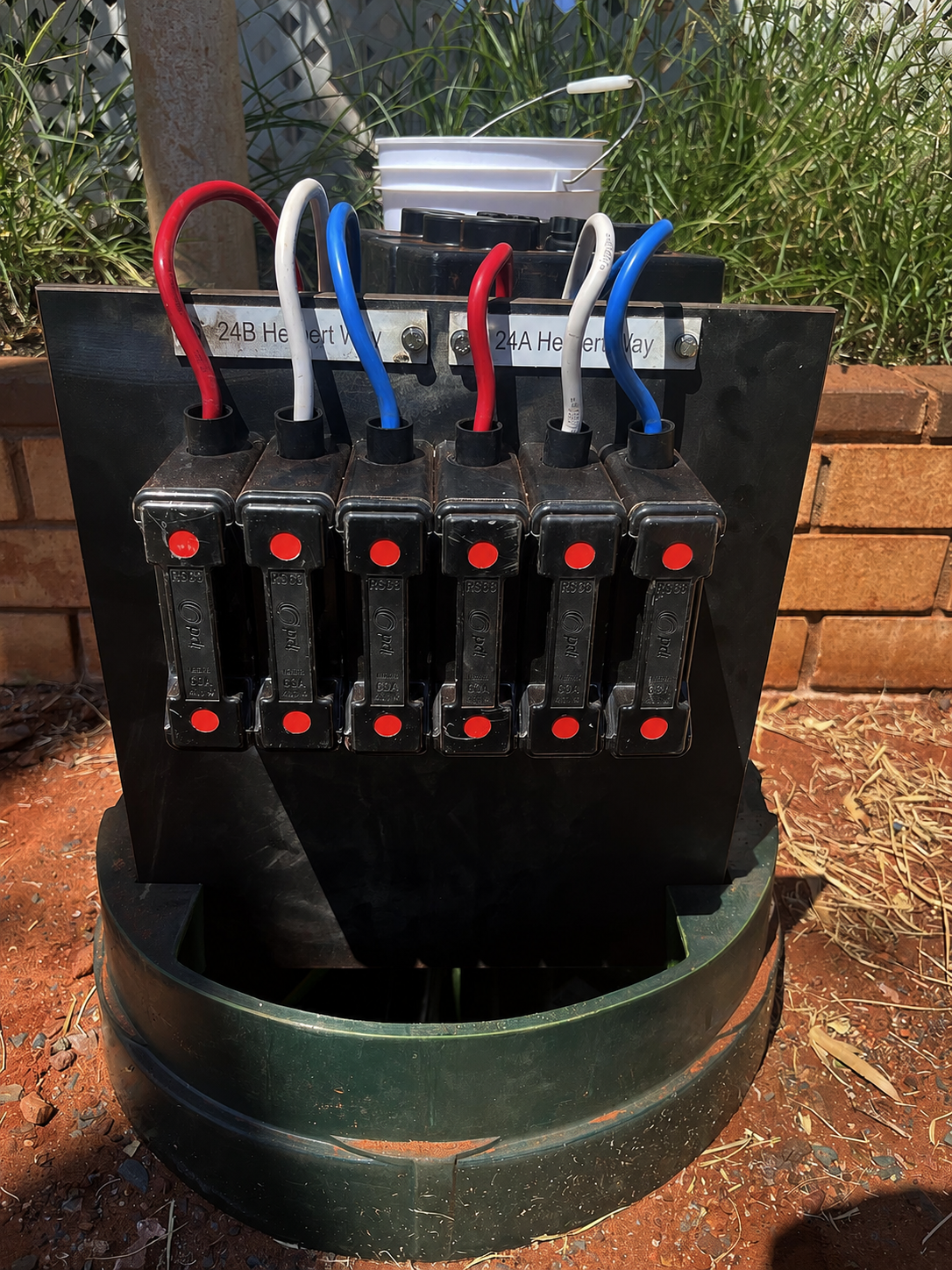 Commercial service fuse board with multi-phase cabling in a street pit